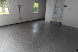 Floor coated in gravel flake epoxy